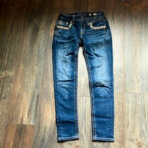 Size 27 mid rise Miss Me skinny jeans
